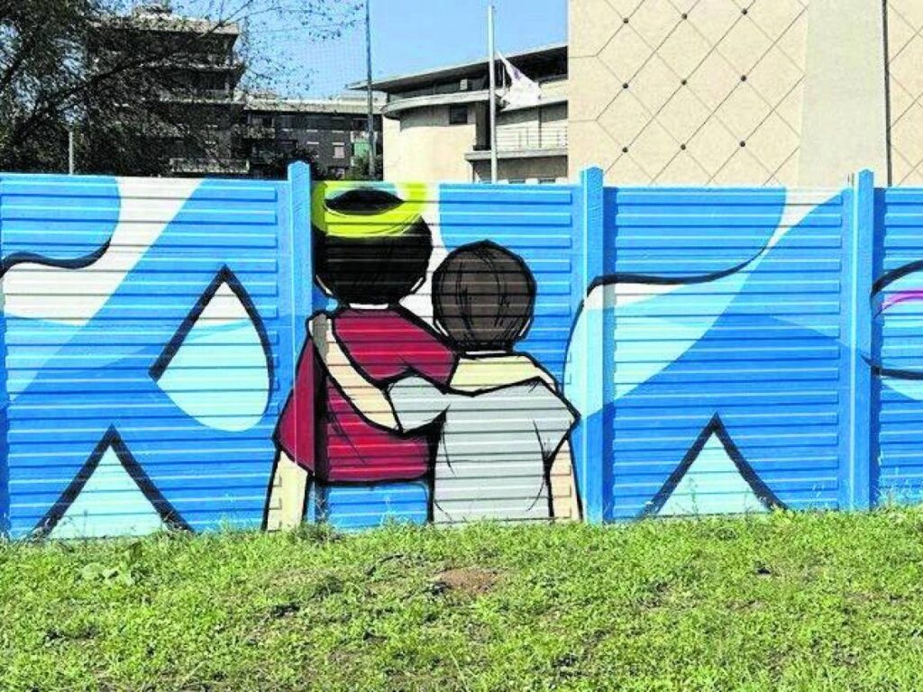 Murale Alan Kurdi a Milano: arte urbana e memoria al Parco Giambellino
